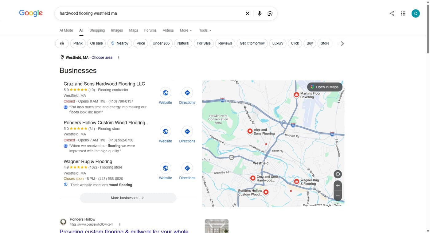 Google results for “hardwood flooring westfield ma”: Cruz and Sons Hardwood Flooring LLC first in the local pack with a 5.0 rating from 10 reviews, above two established flooring stores